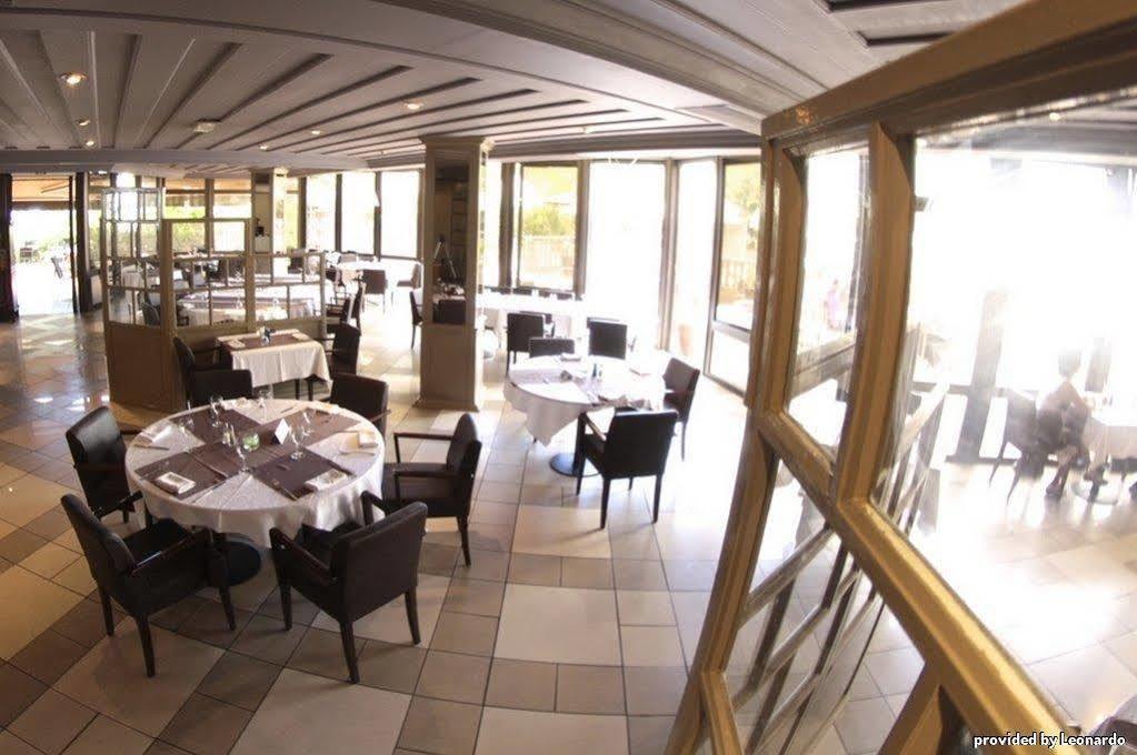 Hotel Le Saint Denis Ресторант снимка